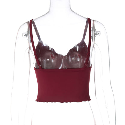 Haut femme à bretelles avec nœud, dos nu, coupe cintrée à la taille, bord ondulé, style bandeau